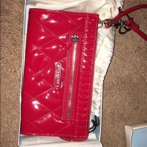 Red leather Coach wristlet